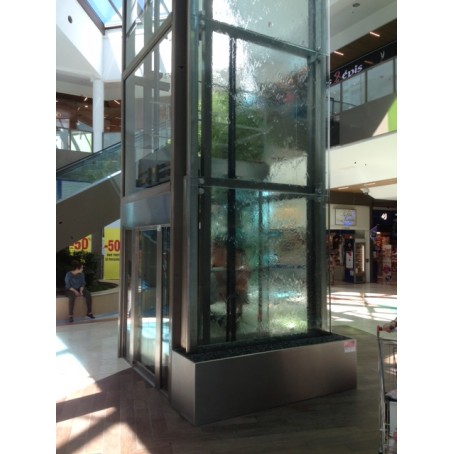 Structure métallique d'ascenseur vitrée-finition laquée-verre agrafé