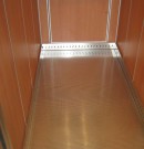 habillage cabine ascenseur sol
